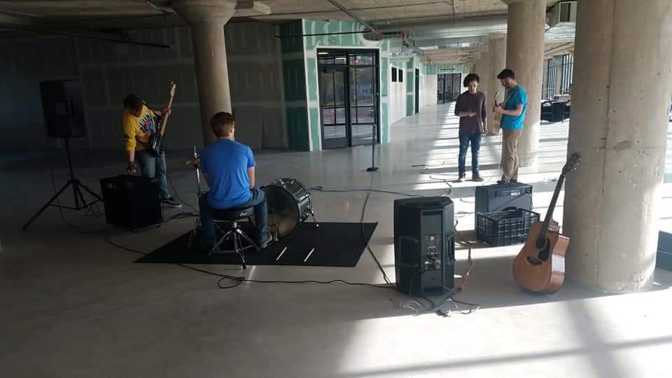 A band playing in a studio